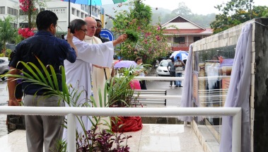 Description: Bishops Wiehe and Wong blessing the memorial